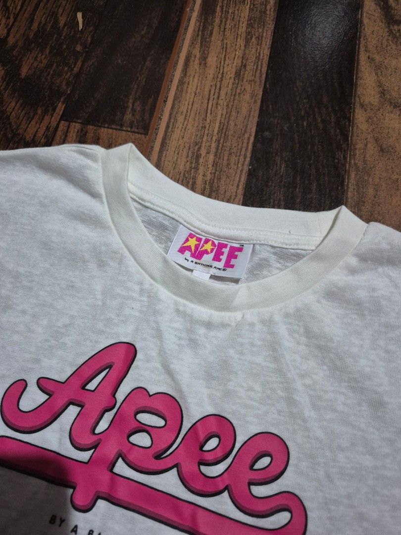 Apee White Pink Graphic T-Shirt (Category: Shirts) located in Tacloban City. Submitted by pascore (Listing ID 1450664019, Image 2). Description: L15W18.