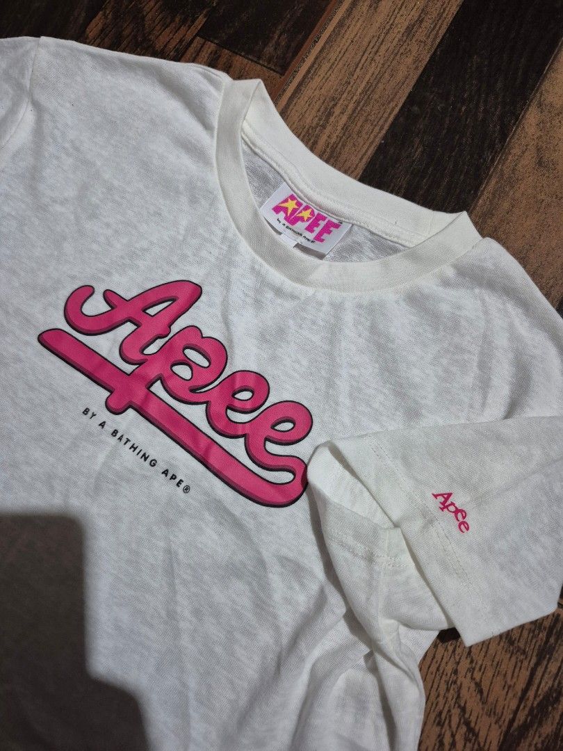 Apee White Pink Graphic T-Shirt (Category: Shirts) located in Tacloban City. Submitted by pascore (Listing ID 1450664019, Image 3). Description: L15W18.