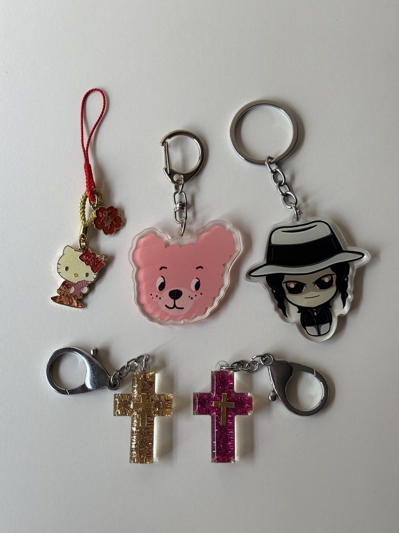 Assorted Keychains (Category: Character Goods) located in Singapore. Submitted by tokagetoffee (Listing ID 1450645066, Image 1). Description: Hello Kitty keychain - $6 Pink Bear keychain - $4 Muzan keychain - $6 Christian cross keychains - $4 each all are still in good condition, trying to sell as they’ve mostly been sitting in my drawer :’).