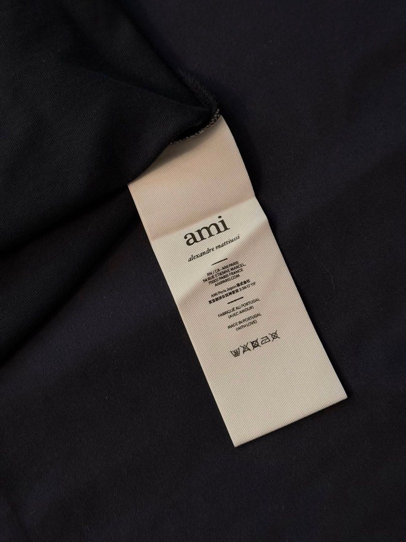 Authentic Ami Tshirt (Category: Luxury Apparel) located in Taguig. Submitted by mainsourceph (Listing ID 1450707524, Image 3). Description: Ami All Black Tshirt Size Small Shirt, Tag and Paper Bag Used Once (Hindi kasya).