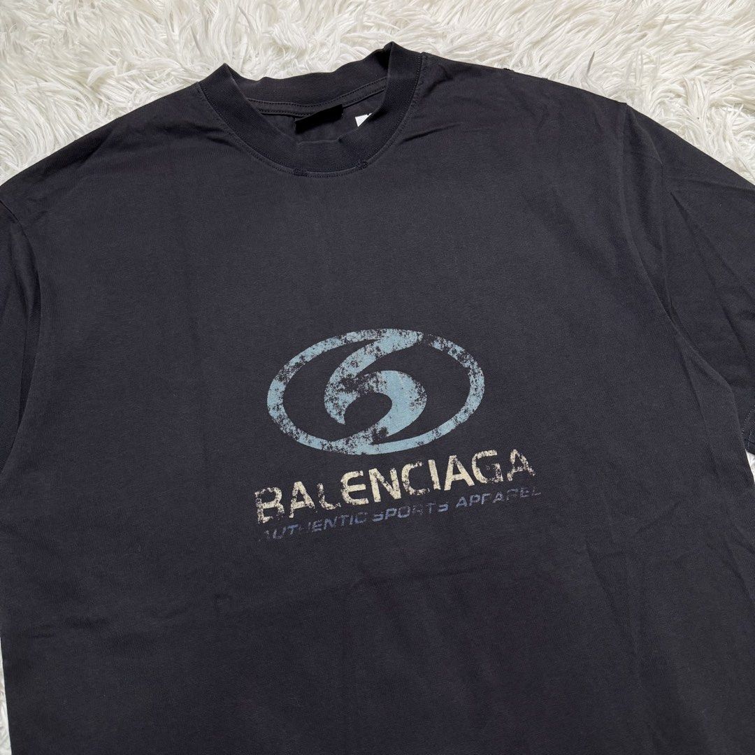 Balenciaga (Category: Luxury Apparel) located in Baguio. Submitted by sellingtonshop (Listing ID 1450690689, Image 3). Description: l15. Balenciaga surfer logo distressed tee (dark grey) Size: S oversized fits M-L Dimes: 28*22 Condition: good as new Issue: none Mine: 880 Steal: 980 Grab: 1180.