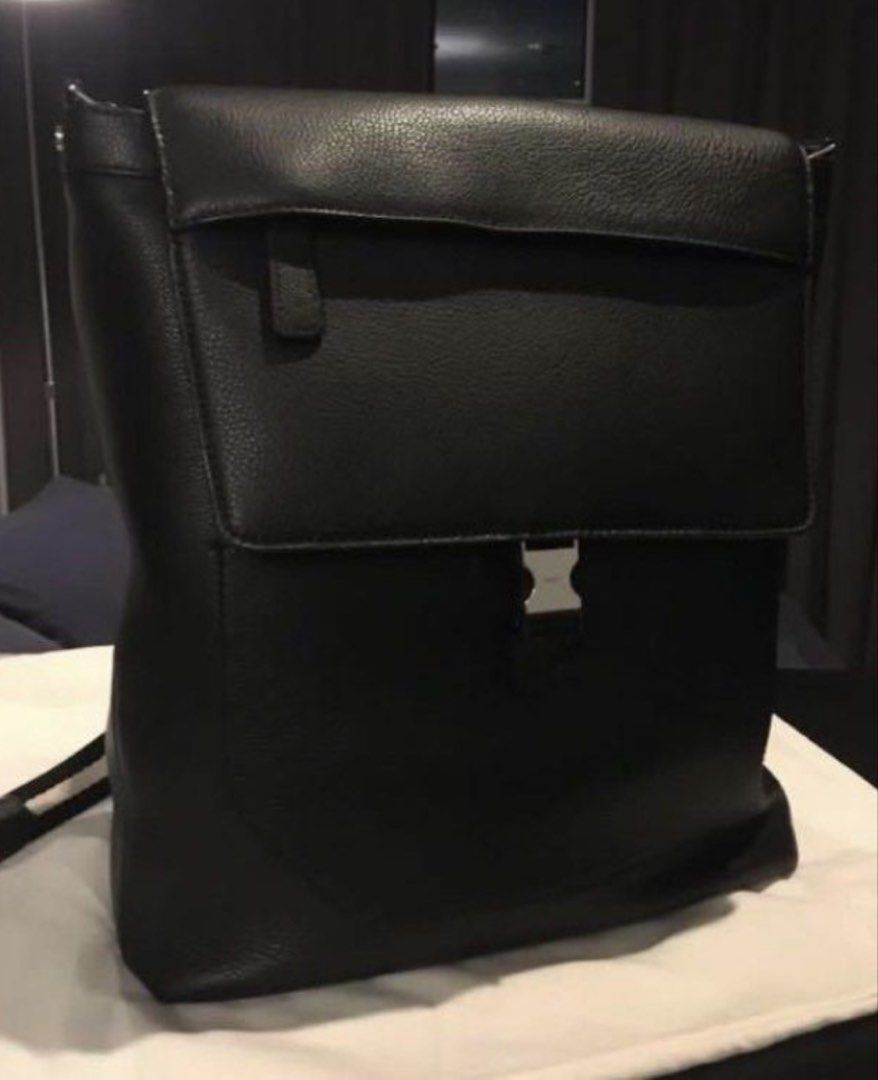 Bally Black Leather Backpack (Category: Luxury Accessories) located in Makati City. Submitted by ed_______ (Listing ID 1450684523, Image 1). Description: - Authentic Bally backpack - Color: Black - Material: Pebbled leather - Closure: Signature Bally buckle - Straps: Adjustable - Includes: Dust bag and authenticity cards - Ideal for: Daily use or travel.