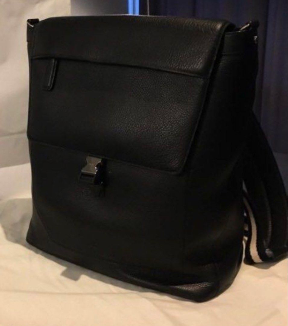 Bally Black Leather Backpack (Category: Luxury Accessories) located in Makati City. Submitted by ed_______ (Listing ID 1450684523, Image 2). Description: - Authentic Bally backpack - Color: Black - Material: Pebbled leather - Closure: Signature Bally buckle - Straps: Adjustable - Includes: Dust bag and authenticity cards - Ideal for: Daily use or travel.