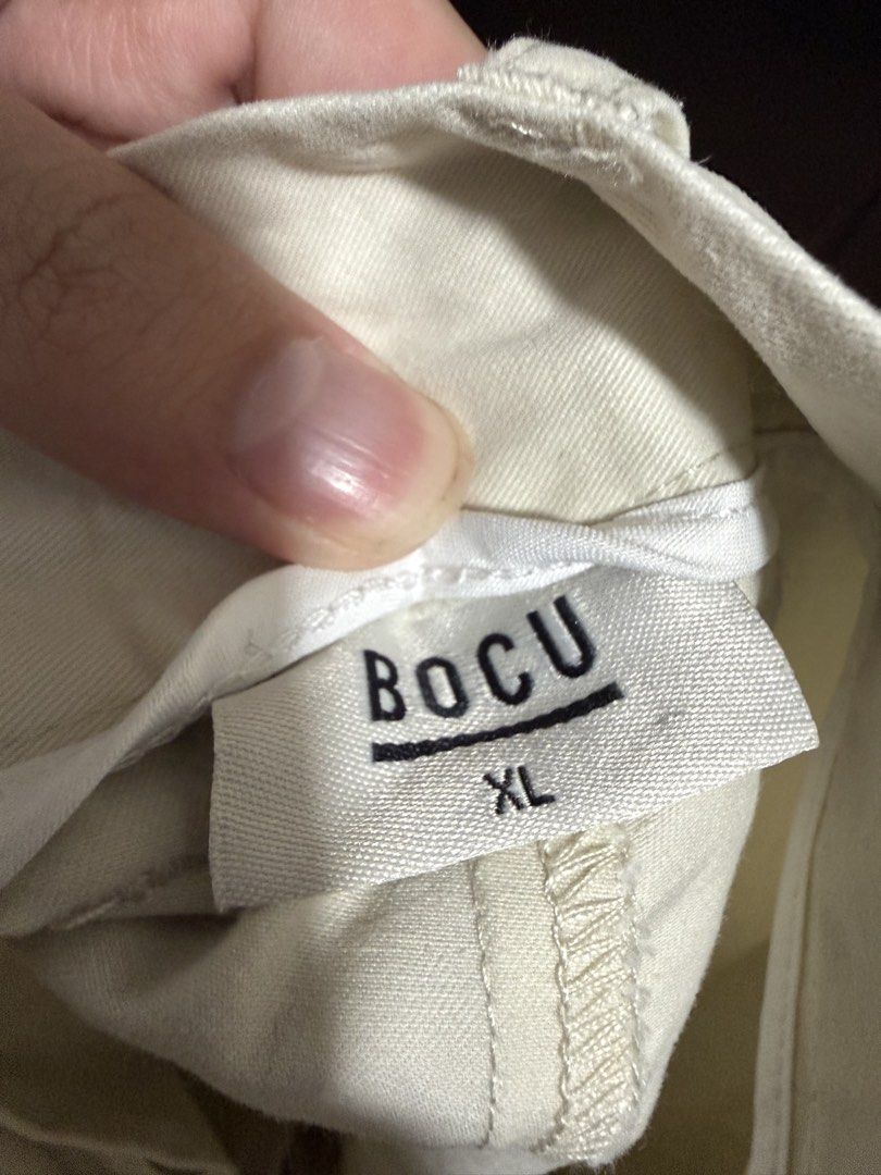 Beige BOCU Cargo Pants XL Size 31 (Category: Other Bottoms) located in Paranaque City. Submitted by jayvee7 (Listing ID 1450670364, Image 3). Description: - Brand: BOCU - Size: XL (31 Waistline) - Color: Light Beige - Features: Multiple pockets (front & sides) - Closure: Button and zip - Style: Casual wear - Condition: Please check photos for details.