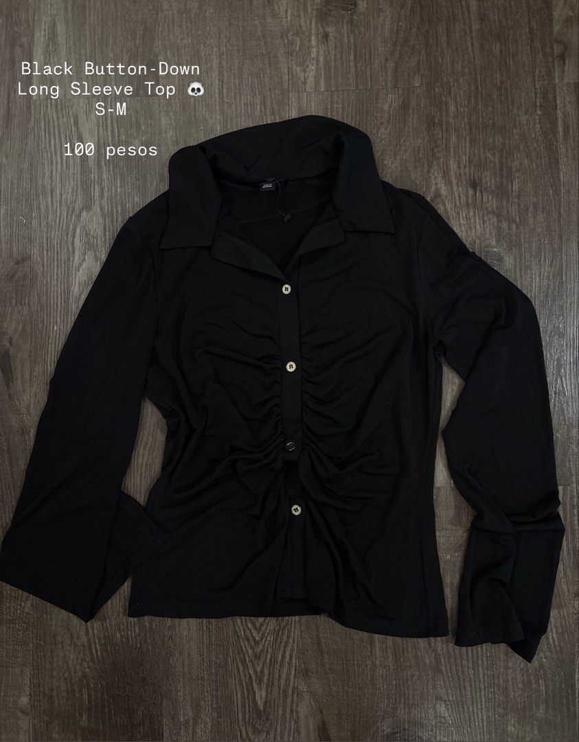 Black Button-Down Long Sleeve Top (Category: Longsleeves) located in Rizal. Submitted by decluttch (Listing ID 1450646932, Image 1). Description: - Classic black button-down long sleeve top - Features a flattering ruched front detail - Ideal for office/casual.