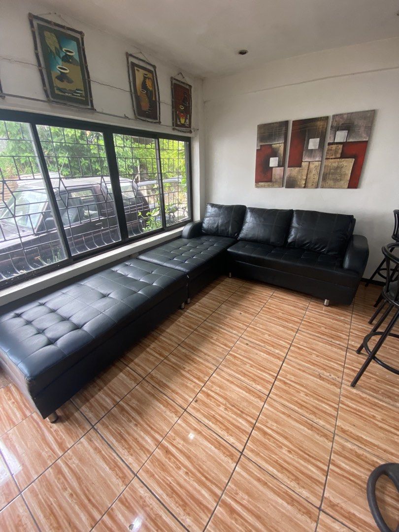 Black Faux Leather Sectional Sofa with Chaise (Category: Sofas) located in Manila. Submitted by burritoenthusiast_5 (Listing ID 1450609244, Image 3). Description: - Black faux leather sectional sofa - Classic tufted cushions - Chaise can be configured on either side - Ample seating space - Ideal for living rooms or lounges - Selling due to declutterring .