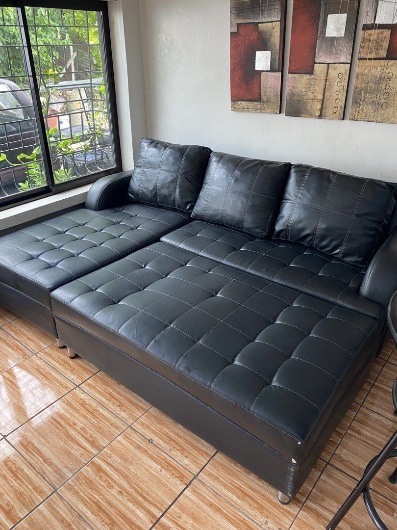 Black Faux Leather Sectional Sofa with Chaise (Category: Sofas) located in Manila. Submitted by burritoenthusiast_5 (Listing ID 1450609244, Image 2). Description: - Black faux leather sectional sofa - Classic tufted cushions - Chaise can be configured on either side - Ample seating space - Ideal for living rooms or lounges - Selling due to declutterring .