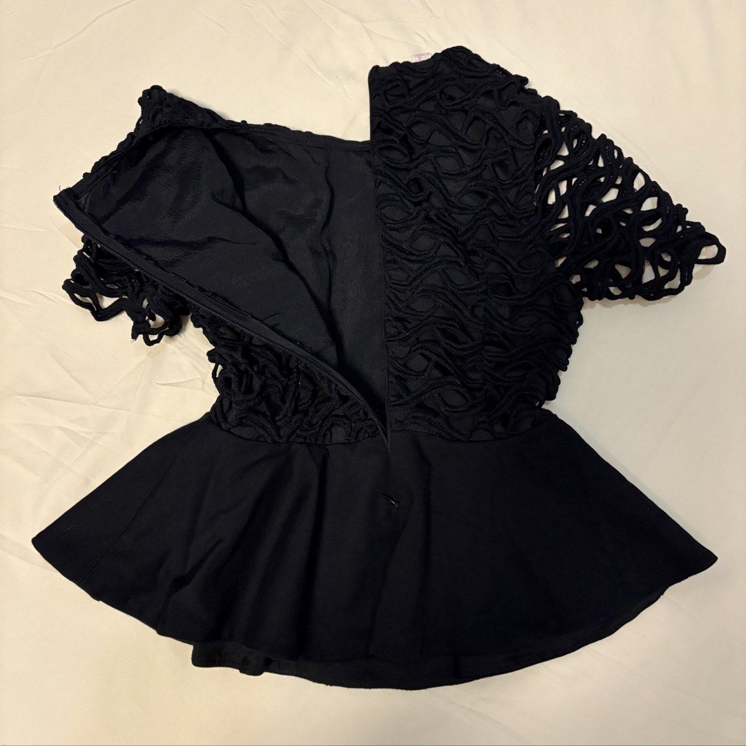 Black Peplum Top with Lace Sleeves (Category: Blouses) located in Santiago. Submitted by archive.drippp (Listing ID 1450719154, Image 2). Description: - Elegant black peplum top - Short sleeves with unique wavy lace detail - Convenient back zipper closure - Thick fabric .