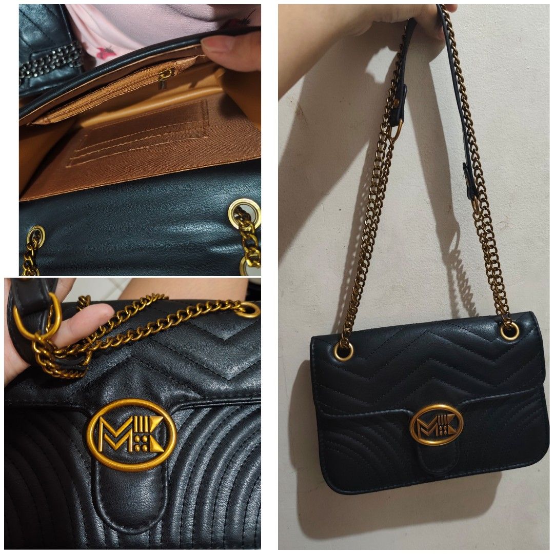 Black Quilted Shoulder Bag with Gold Chain (Category: Shoulder Bags) located in Makati City. Submitted by ainayabs (Listing ID 1450578688, Image 1). Description: - Stylish black quilted shoulder bag - Elegant gold chain strap - Interior zippered pocket and slip pocket - Front flap with decorative gold emblem - Versatile for going out or everyday wear - Immaculately clean inside and out.