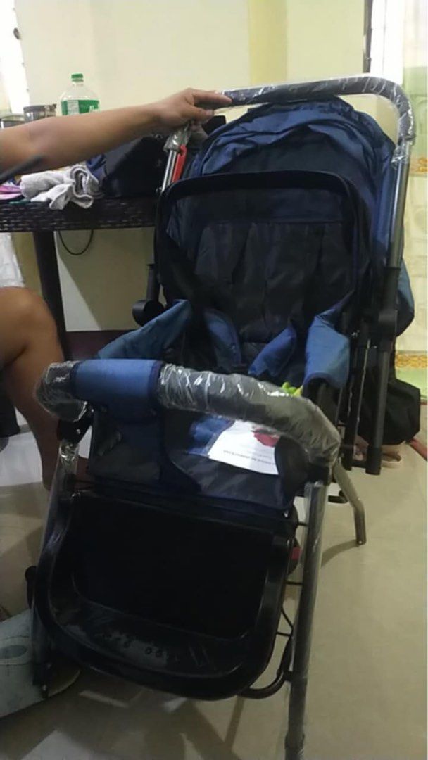 Blue Baby Stroller (Category: Strollers) located in Manila. Submitted by nlm11 (Listing ID 1450596724, Image 2). Description: - Blue baby stroller - Comes with canopy and tray - Armrest has protective plastic wrap - Ready for immediate use - Easy to fold and carry.