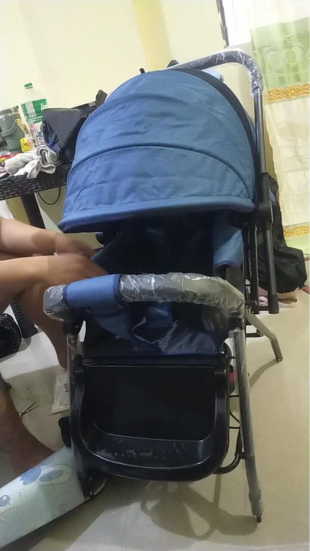 Blue Baby Stroller (Category: Strollers) located in Manila. Submitted by nlm11 (Listing ID 1450596724, Image 1). Description: - Blue baby stroller - Comes with canopy and tray - Armrest has protective plastic wrap - Ready for immediate use - Easy to fold and carry.