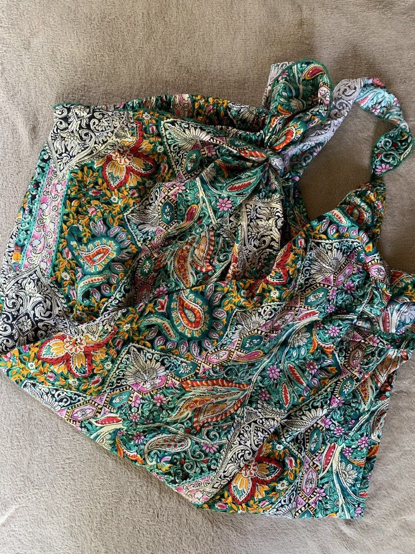 Boho Paisley Print Wrap Maxi Skirt (Category: Skirts) located in Daraga. Submitted by shevvv28 (Listing ID 1450658783, Image 2). Description: - Long wrap skirt with a vibrant paisley print. - Features shades of green, red, orange, and white. - Adjustable tie waist for a perfect fit. - Versatile: can be worn as a skirt or styled as a dress. - Ideal for beach days or casual outings..
