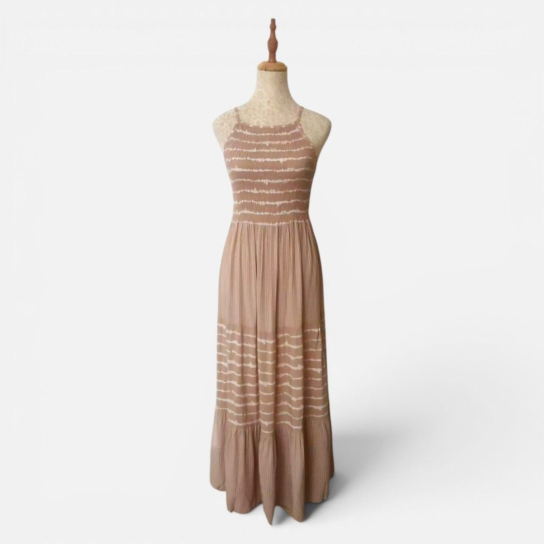 Boho Smocked Tiered Maxi Dress (Category: Dresses) located in Mandaue City. Submitted by stylefigjam (Listing ID 1450537581, Image 1). Description: - Lightweight maxi dress - Smocked bodice - Spaghetti straps - Tiered skirt - Subtle tie-dye pattern - Flowy and comfortable fabric - Ideal for casual outings or beach days - Easy to wear and style - freesize but can fit up to M body frames.