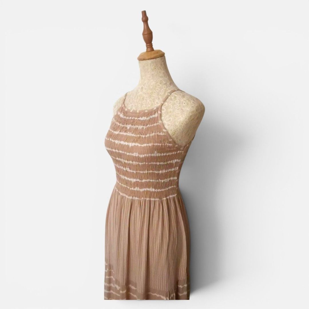 Boho Smocked Tiered Maxi Dress (Category: Dresses) located in Mandaue City. Submitted by stylefigjam (Listing ID 1450537581, Image 2). Description: - Lightweight maxi dress - Smocked bodice - Spaghetti straps - Tiered skirt - Subtle tie-dye pattern - Flowy and comfortable fabric - Ideal for casual outings or beach days - Easy to wear and style - freesize but can fit up to M body frames.
