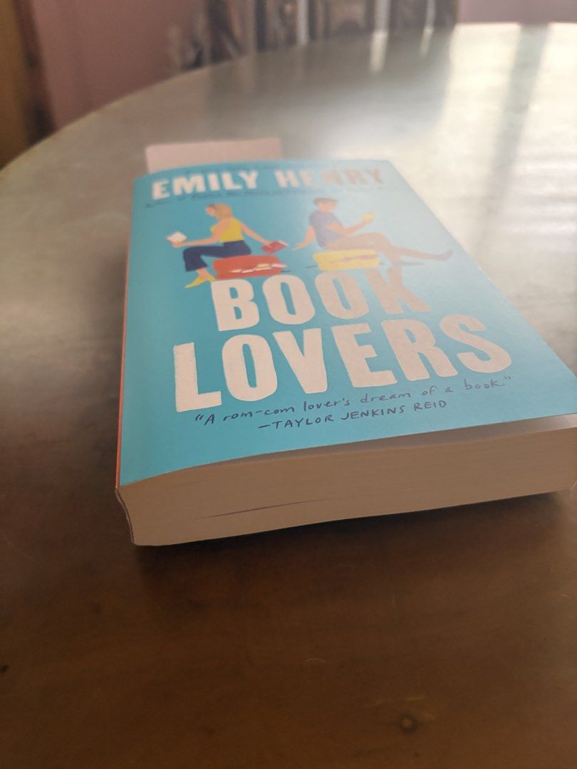 Book Lovers by Emily Henry (Category: Storybooks) located in Cagayan de Oro. Submitted by coffee.bin (Listing ID 1450655858, Image 3). Description: ‼️Bought from Fully Booked 30% off original price No annotations, foxing, or tears. Slight yellowing only on one side of the book (bottom part). Recently bought from Fully Booked (07/16/26) View pictures for condition of the book. Book will be wrapped with thick plastic cover before shipping. .