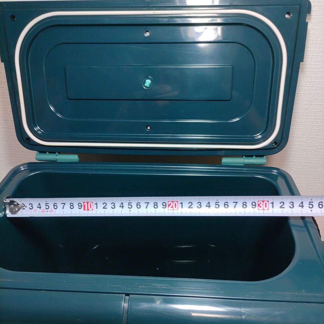 Branded Cooler Box with Foldable Table (Category: Storage Boxes & Baskets) located in Quezon City. Submitted by m2yjapansurplus_quezoncity (Listing ID 1450711881, Image 3). Description: - kulang lang isang Lock. Aside from that its good. Orig Price nito 3k+ Green cooler box with integrated foldable table - Ideal for picnics, camping, and outdoor adventures - Table legs fold neatly for compact storage - Includes a convenient carrying strap - Dimen
