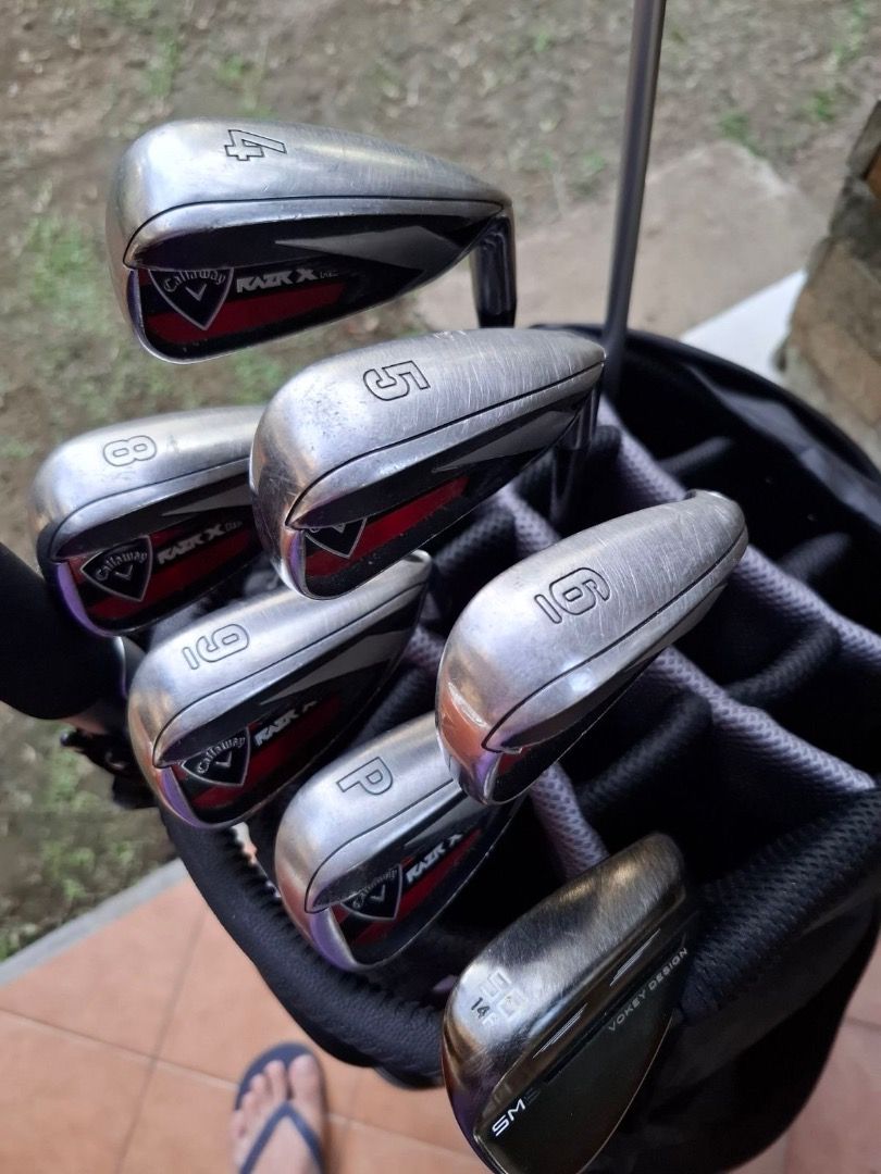 Callaway Razr X Golf Club Set (Category: Golf) located in Quezon City. Submitted by thirdy33551 (Listing ID 1450615799, Image 2). Description: - Set of Callaway Razr X golf clubs - Includes: Razr X Black: 3-wood, 5-wood - Irons: Razr X HL: 4, 5, 6, 8, 9, PW - missing 7 iron - Vokey Design Sand Wedge 56deg - 9 pcs golf clubs only, Golf Bag not included i can sell the fairway woods separately at P3,500 each. additional Odyssey Metal-X putter add P3