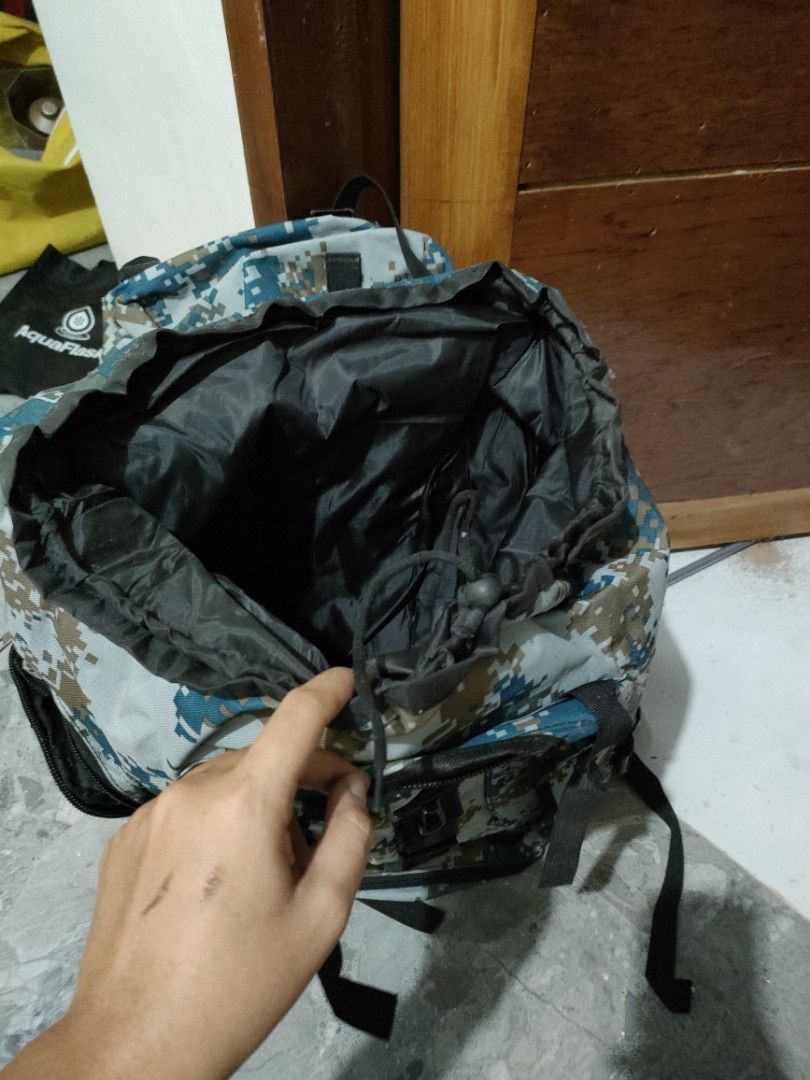 Camouflage Backpack (Category: Backpacks) located in General Santos City (Dadiangas). Submitted by rjb21 (Listing ID 1450649243, Image 2). Description: - Durable camouflage backpack - Main compartment with secure drawstring closure - Multiple external pockets for easy organization - Comfortable padded shoulder straps - Ideal for hiking adventures or travel.