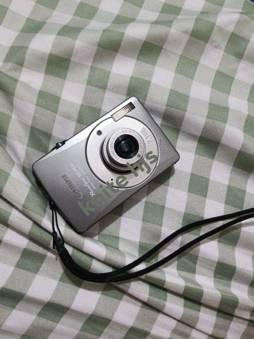 Canon ixus powershot sd750 Digital Camera Silver (Category: Cameras) located in Bansud. Submitted by shujieyonu (Listing ID 1450611285, Image 1). Description: Body is like new - As is, no battery and SD card!!! - Silver Canon powershot sd750 digital camera - Features 2.1x optical zoom lens - Screen displays 'Lens error. Restart camera.' message - Ideal for parts or for repair - Price listed is LP already.
