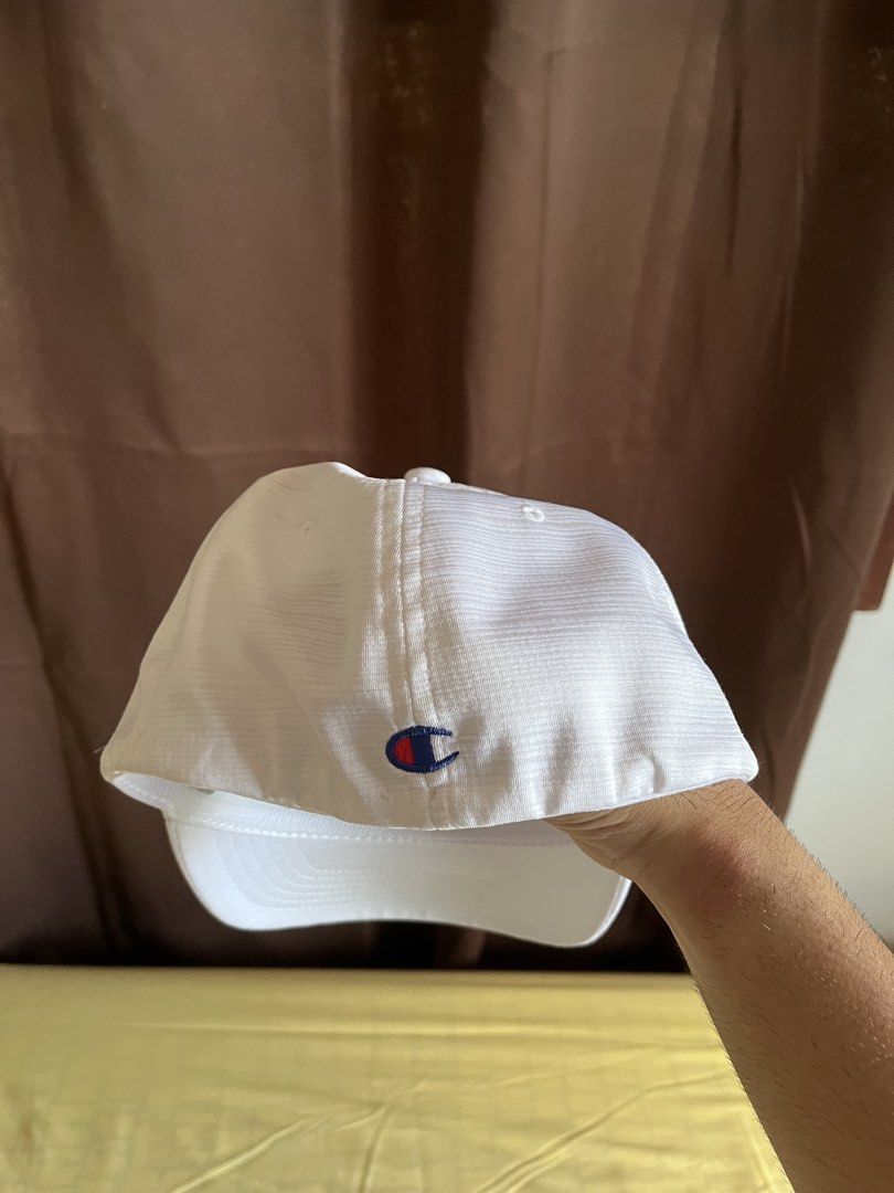 Champion Flexfit White Cap (Category: Caps & Hats) located in Roxas City. Submitted by la211 (Listing ID 1450549816, Image 3). Description: Classic Champion cap with embroidered logo. Features Flexfit for comfort. Perfect for daily wear..