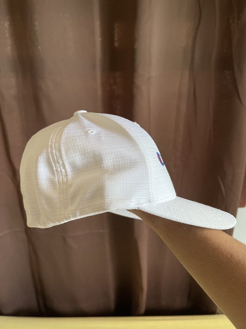 Champion Flexfit White Cap (Category: Caps & Hats) located in Roxas City. Submitted by la211 (Listing ID 1450549816, Image 2). Description: Classic Champion cap with embroidered logo. Features Flexfit for comfort. Perfect for daily wear..