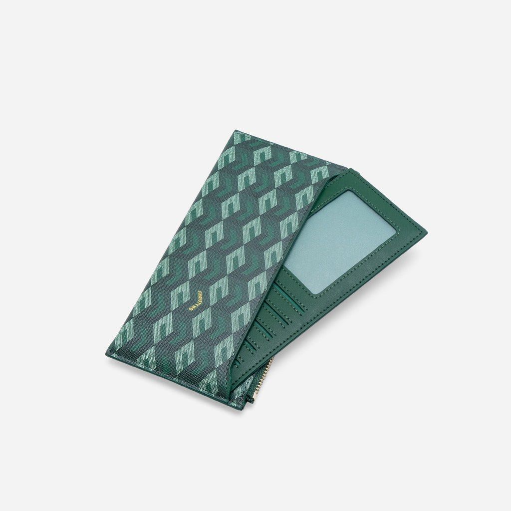 Christy Ng Green Monogram Long Wallet with Zipper (Category: Wallets & Card holders) located in Bacolod City. Submitted by tmyshop21 (Listing ID 1450551270, Image 2). Description: - Stylish green long wallet with a cool geometric monogram pattern. - Includes a secure zippered compartment for your essentials. - Multiple card slots to keep your cards organized. - Features a sleek gold zipper detail for a modern look. - Perfect for keeping cash and 