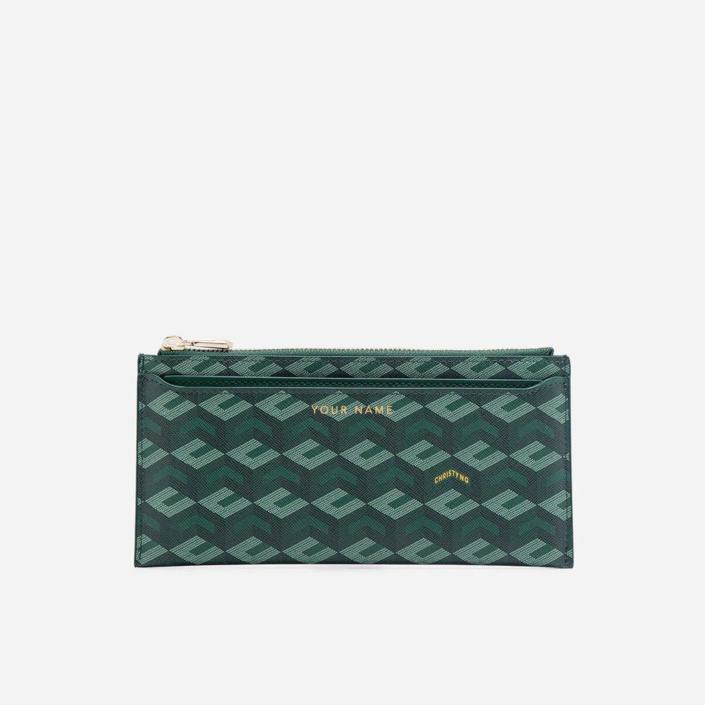 Christy Ng Green Monogram Long Wallet with Zipper (Category: Wallets & Card holders) located in Bacolod City. Submitted by tmyshop21 (Listing ID 1450551270, Image 1). Description: - Stylish green long wallet with a cool geometric monogram pattern. - Includes a secure zippered compartment for your essentials. - Multiple card slots to keep your cards organized. - Features a sleek gold zipper detail for a modern look. - Perfect for keeping cash and 