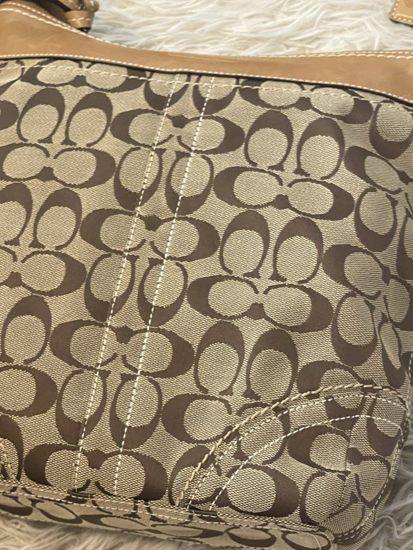 Coach Canvas & Leather Crossbody Bag 10403 (Category: Cross-body Bags) located in Mandaluyong City. Submitted by mattlazz (Listing ID 1450569209, Image 3). Description: - Classic Coach monogram canvas crossbody bag - Tan leather trim and strap - Back zipper pocket for secure storage - Adjustable strap for comfortable wear - Ideal for everyday use - Charm not included - Can fit an iPad, interior is clean Php 3,900 only Pick up/meet up Mandaluyong 