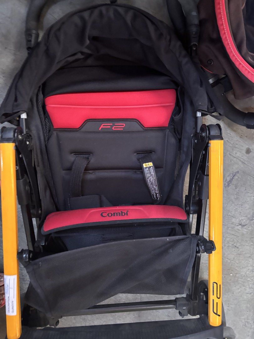Combi F2 Todler Stroller Red Black (Category: Strollers) located in Quezon City. Submitted by m2yjapansurplus_quezoncity (Listing ID 1450713830, Image 1). Description: - Combi F2 stroller in red and black - Lightweight and easy to maneuver - Features a secure 5-point harness - Convenient storage basket underneath - Compact folding for easy storage and travel - Ideal for everyday outings.