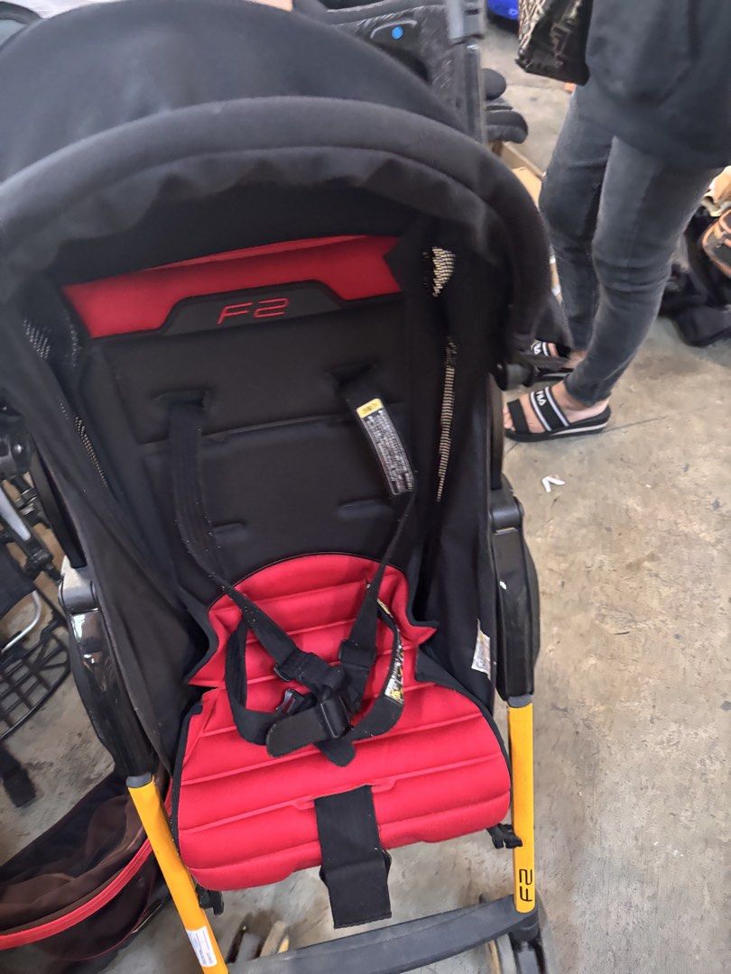 Combi F2 Todler Stroller Red Black (Category: Strollers) located in Quezon City. Submitted by m2yjapansurplus_quezoncity (Listing ID 1450713830, Image 2). Description: - Combi F2 stroller in red and black - Lightweight and easy to maneuver - Features a secure 5-point harness - Convenient storage basket underneath - Compact folding for easy storage and travel - Ideal for everyday outings.