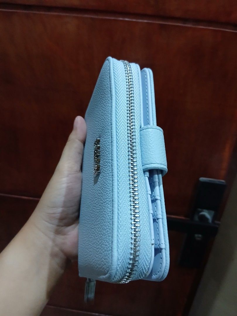 Compact medium wallet Italy brand (Category: Wallets & Card holders) located in Macabebe. Submitted by collectionspurses (Listing ID 1450553662, Image 3). Description: Sofer classy look! so stylish! limited style, very rare to find, as in exclusive lang saten. tapos ganda pa ng pagka blue!! 🥹😱❤️.
