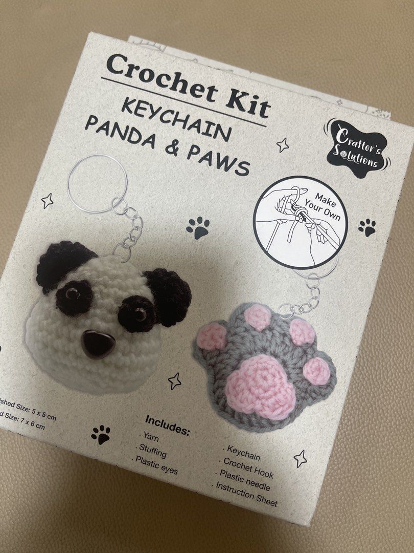 Crafter's Solutions Crochet Kit Keychain Panda & Paws (Category: Handmade Craft) located in Manila. Submitted by preloved.mademoiselle (Listing ID 1450630688, Image 1). Description: - DIY Crochet Kit: Make your own adorable panda and paw keychain! - All-Inclusive: Comes with yarn, stuffing, plastic eyes, keychain ring, crochet hook, plastic needle, and easy-to-follow instructions. - Perfect Size: Finished panda is approx. 5x5 cm, paw is approx. 7