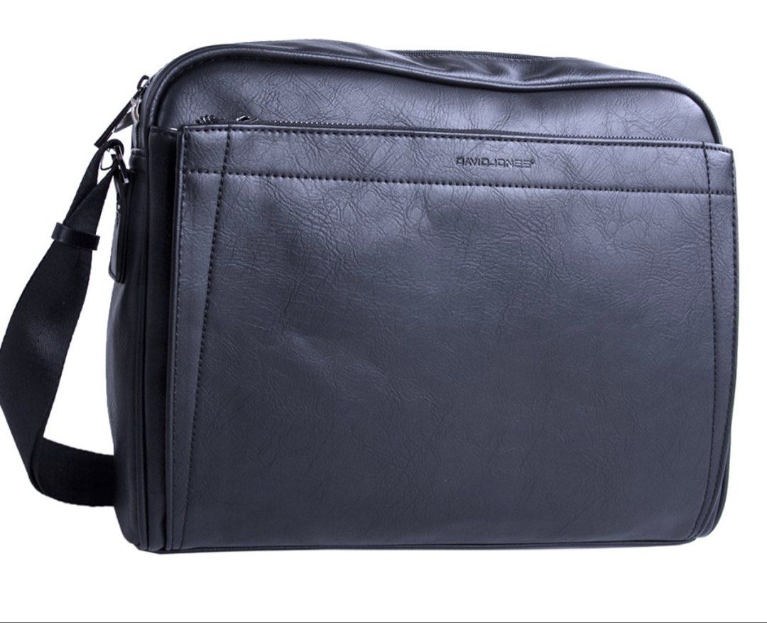 David Jones Black Shoulder Bag (Category: Luxury Bags & Wallets) located in Mexico. Submitted by 3everything (Listing ID 1450721664, Image 1). Description: - Brand: David Jones - Color: Black - Exterior: Front zip pocket - Interior: Main compartment with internal pockets and laptop compartment - Strap: Adjustable - Ideal for: Daily use, travel - Condition: Clean interior Location Pampanga .