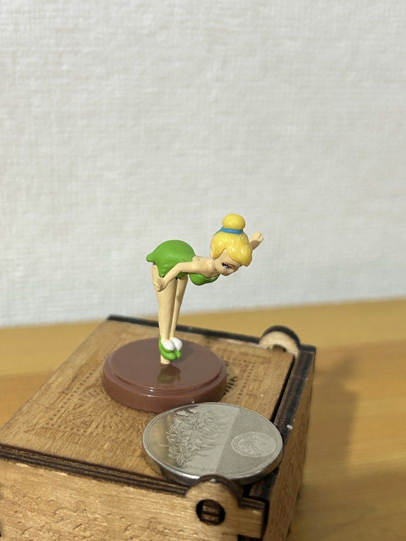 Disney Tinkerbell Mini Figurine Toy (Category: Figurines & Statues) located in Pateros City. Submitted by cleanmycloset (Listing ID 1450649776, Image 3). Description: - Adorable Tinkerbell figurine - Fun, adventurous pose - Ideal for Disney fans and collectors - Small and highly detailed - Great for display purposes - A fun collectible piece.