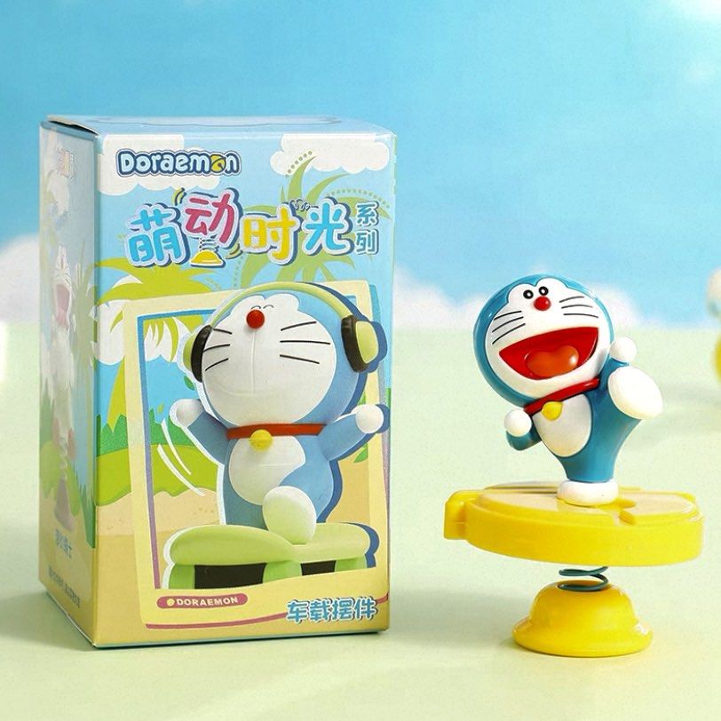 Doraemon Bouncing Spring (Category: Toy Figures) located in Singapore. Submitted by coffeeclub_ (Listing ID 1450628708, Image 1). Description: - Adorable Doraemon bouncing spring - Shakes with a gentle touch - Brand new in original packaging - Ideal for collectors - Great as a car accessory - Fun desk toy.