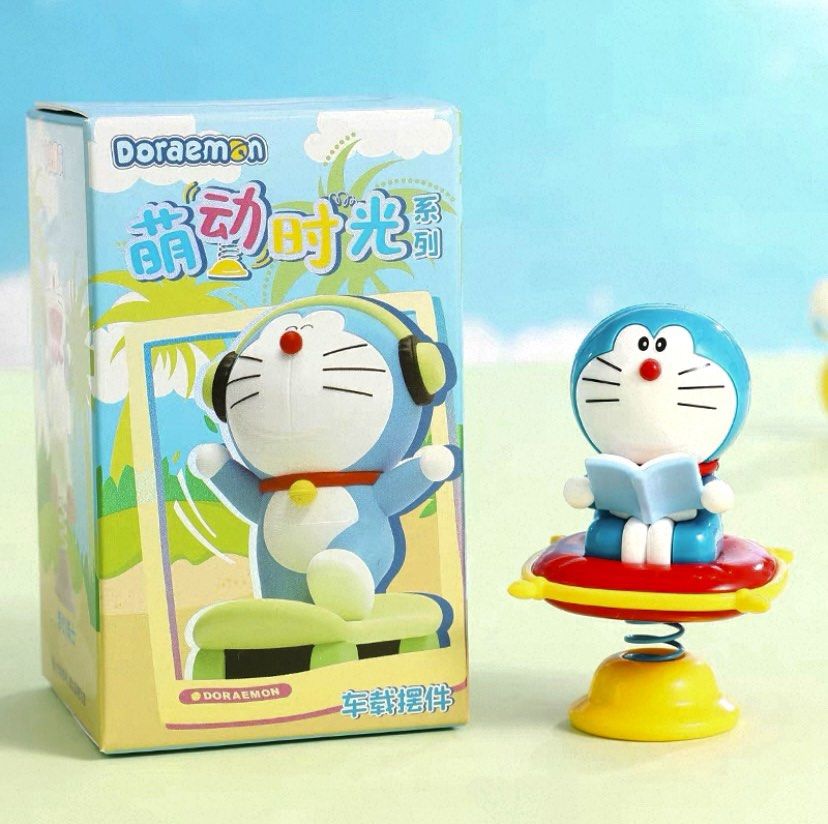 Doraemon Bouncing Spring (Category: Toy Figures) located in Singapore. Submitted by coffeeclub_ (Listing ID 1450628708, Image 3). Description: - Adorable Doraemon bouncing spring - Shakes with a gentle touch - Brand new in original packaging - Ideal for collectors - Great as a car accessory - Fun desk toy.