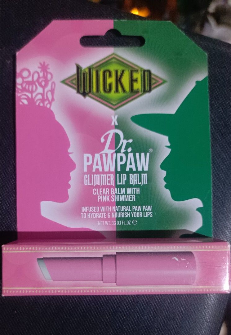 Dr. PawPaw Wicked Glimmer Lip Balm (Category: Makeup) located in Caloocan City. Submitted by criddyrabb11103 (Listing ID 1450666421, Image 1). Description: - Dr. PawPaw x Wicked collaboration lip balm - Clear balm with a beautiful pink shimmer - Infused with natural paw paw for hydration and nourishment - Comes in a cute, collectible pink tube - Ideal for daily wear or adding a subtle sparkle.