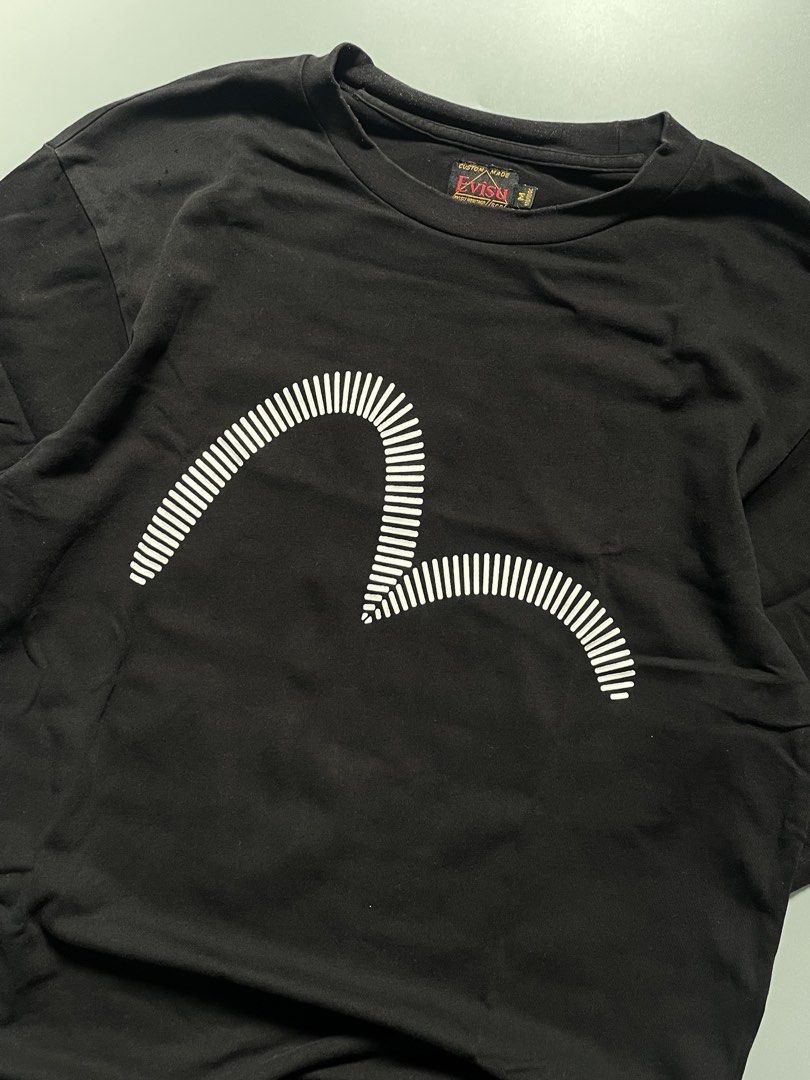 EVISU (Category: Tshirts & Polo Shirts ) located in Leyte. Submitted by drn_rags (Listing ID 1450540887, Image 3). Description: EVISU • condition: 9.5/10 • color rate: 9.5/10 • width: 20.5 • length: 29 • size medium • issue: minimal pinholes .