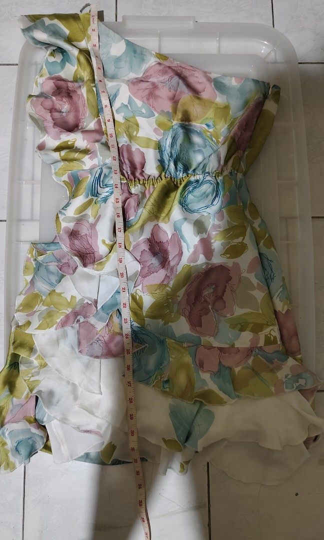One shoulder Floral dress (Category: Dresses) located in Manila. Submitted by faye_cutedeclutter (Listing ID 1450704073, Image 2). Description: Size: small on tag but fits up to med waist: 26 to 30 bust: 34 and up one-shoulder design with ruffle details 💸: 220 💵: GCASH/PAYMAYA/PAYPAL/BANK TRANSFER rfs: declutter kaya everything that I sell are at low price only - can give discount to other items if u buy 2 or more ⭐: color may vary due to light