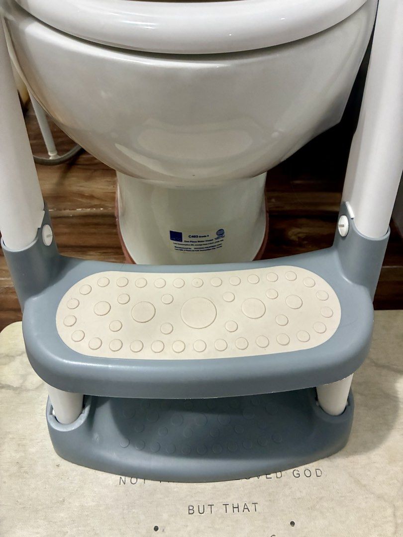 Foldable Adjustable Potty Training Seat with Step Stool (Category: Toilet Training) located in Quezon City. Submitted by inmycloset03 (Listing ID 1450664840, Image 2). Description: - Adjustable seat for a secure fit on standard toilets - Built-in step stool for easy, independent climbing - Handles provide extra support and confidence - Easy to clean and maintain - Ideal for transitioning from diapers to the toilet.