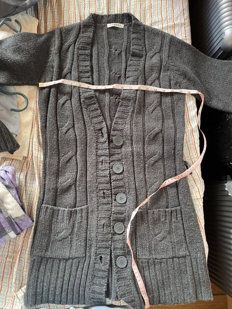 George Grey Cable Knit Longline Cardigan/Coat (Category: Coats, Jackets and Outerwear) located in Santa Rosa. Submitted by jstna (Listing ID 1450540723, Image 2). Description: - Grey cable knit longline cardigan by George - Button front closure - Two functional pockets - Material: 100% Acrylic - Size: UK 10 / EUR 38 - Ideal for layering over outfits, for cold weather.