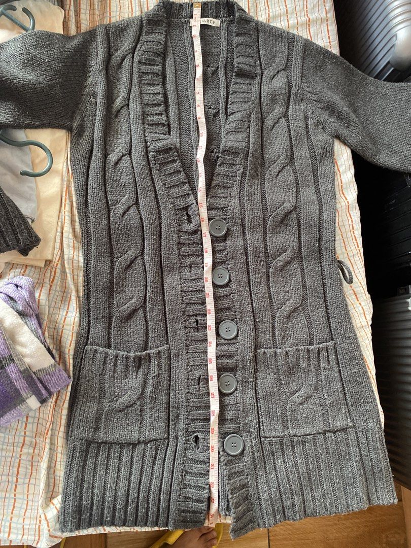George Grey Cable Knit Longline Cardigan/Coat (Category: Coats, Jackets and Outerwear) located in Santa Rosa. Submitted by jstna (Listing ID 1450540723, Image 3). Description: - Grey cable knit longline cardigan by George - Button front closure - Two functional pockets - Material: 100% Acrylic - Size: UK 10 / EUR 38 - Ideal for layering over outfits, for cold weather.
