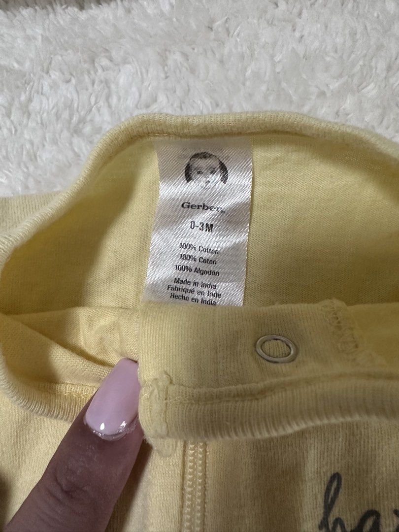 Gerber Baby Sleepsuits 0-3M (2 pcs) (Category: Babies & Kids Fashion) located in San Juan City. Submitted by ilovetigers (Listing ID 1450599380, Image 2). Description: Take all 400 - Set of 2 Gerber baby sleepsuits - Size: 0-3 months - Design 1: Yellow with 'happy together' giraffes - Design 2: Light blue & white stripes with elephant and giraffe - Material: 100% Cotton - Features: Front zip for easy dressing - Benefit: Keeps baby cozy and comfor