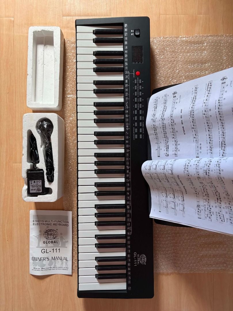 Global GL-111 Digital\ Electronic Piano\ Keyboard Compact Sized 61 Keys (Category: Musical Instruments) located in San Luis. Submitted by blutey (Listing ID 1450665108, Image 3). Description: Bought but never used, complete and in excellent condition. Handy \ Compact Sized Keyboard > 61 Keys Percussion >256 Timbres and 256 Rhythms > Rhythm, Cord Volume Control > Single Finger Cord, Multi - Finger Cord > Demonstration and Learning Functions > Spli
