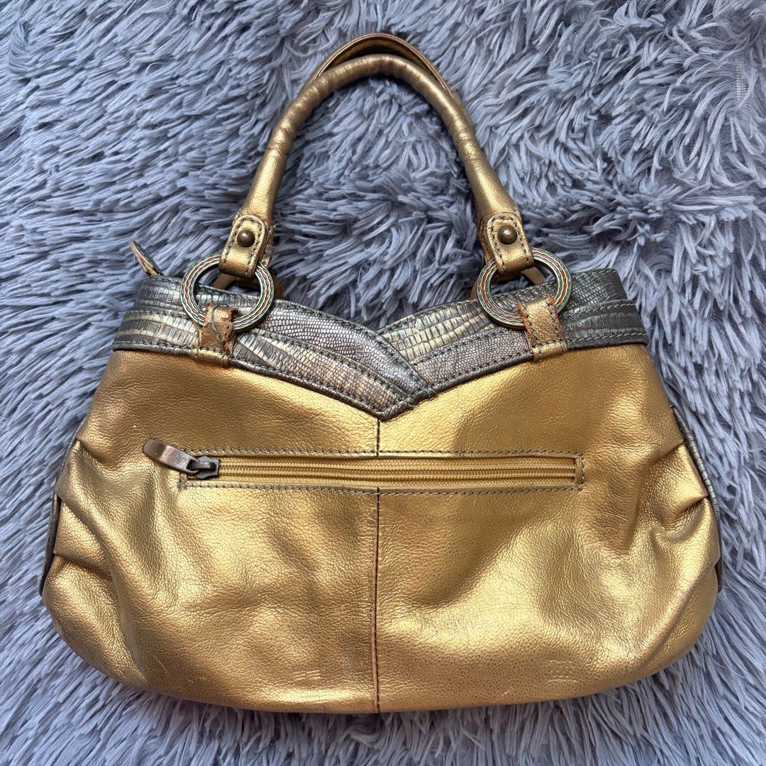 Gold Metallic Handbag with Floral Design (Category: Luxury Bags & Wallets) located in Iloilo. Submitted by faerysha_ (Listing ID 1450549802, Image 2). Description: .