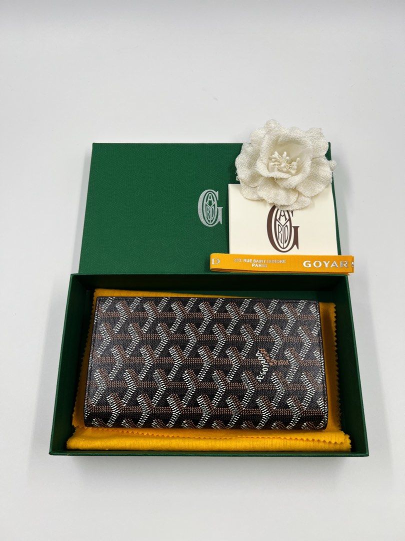 ⚜️Goyard - Saint lambert / phone wallet (Category: Luxury Bags & Wallets) located in Makati City. Submitted by 90sangel (Listing ID 1450633865, Image 2). Description: *The Saint-Lambert wallet is a universal phone case with all the everyday essentials in one place 🪪💸 •Size: 17.5 x 10cm •Condition: New with 6 card slots, 2 flat pockets, large pocket for notes or a phone. *The case also protects your phone from everyday bumps and scratches. Its s