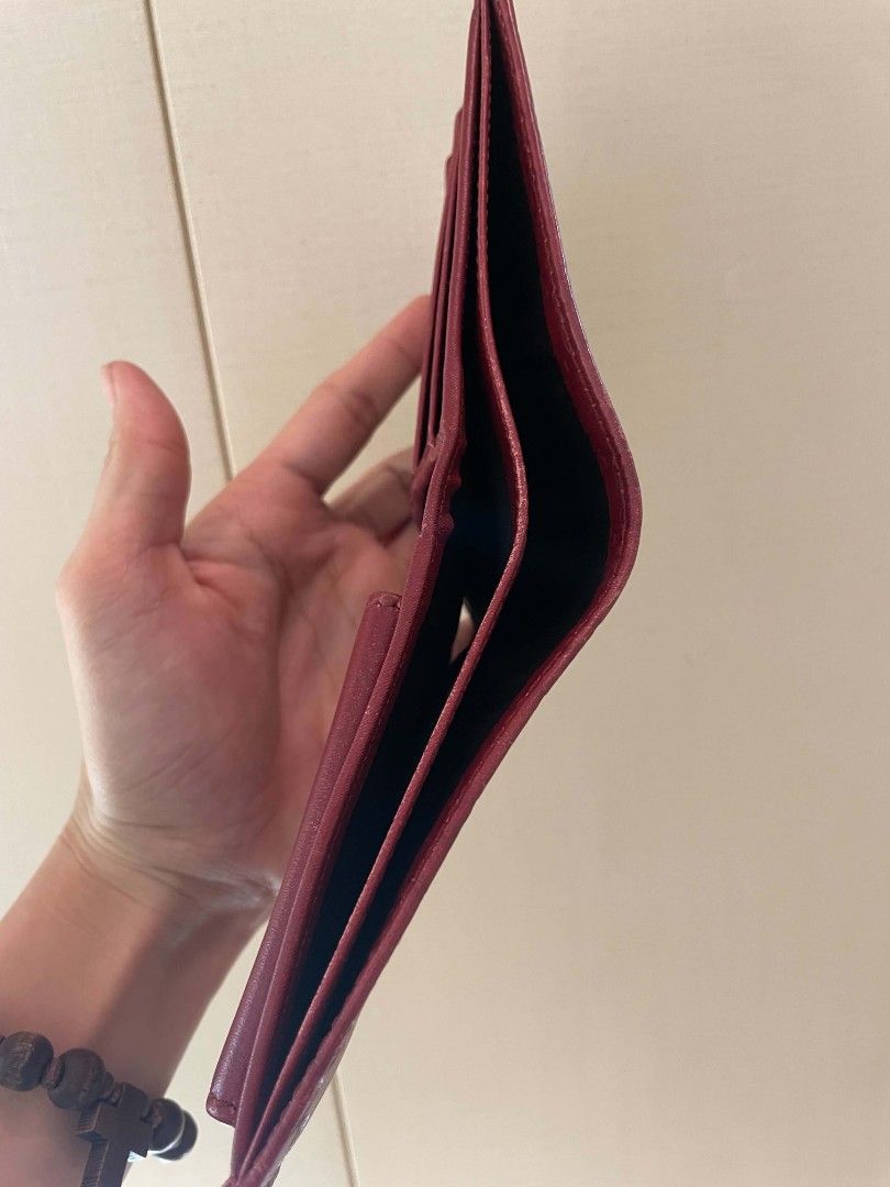 Gucci Guccisima Red Monogram Bi-fold Wallet (Category: Luxury Bags & Wallets) located in Plaridel. Submitted by collectors_blocc (Listing ID 1450596326, Image 3). Description: - Authentic red Gucci bi-fold wallet - Classic GG monogram embossed all over - Metal accent on the front - Ample space for cards and cash - Ideal for everyday use.