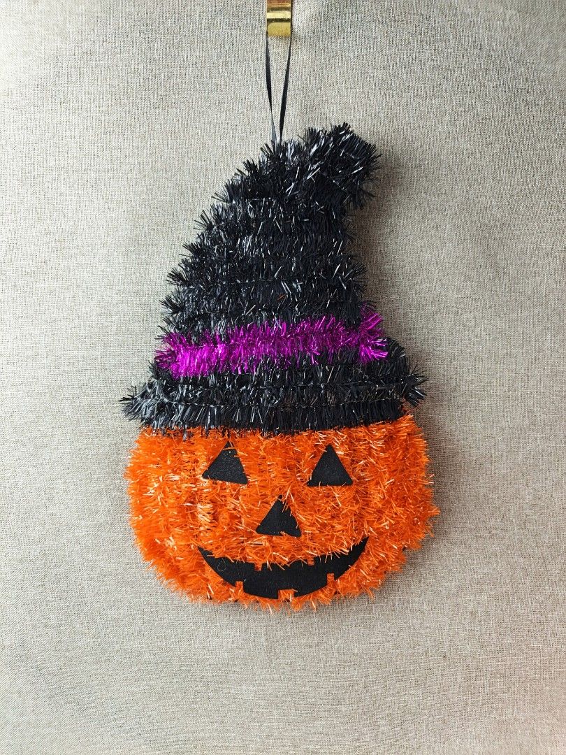 Halloween Pumpkin Witch Hat Tinsel Hanging Decoration (Category: Occasions & Party Supplies) located in Baguio. Submitted by rustyribbon (Listing ID 1450702793, Image 1). Description: Halloween decoration- tinsel pumpkin with a witch hat 9.5" x 14.5", 2 PCs available 120 +sf mop: gcash/maya mod: j&t payo .