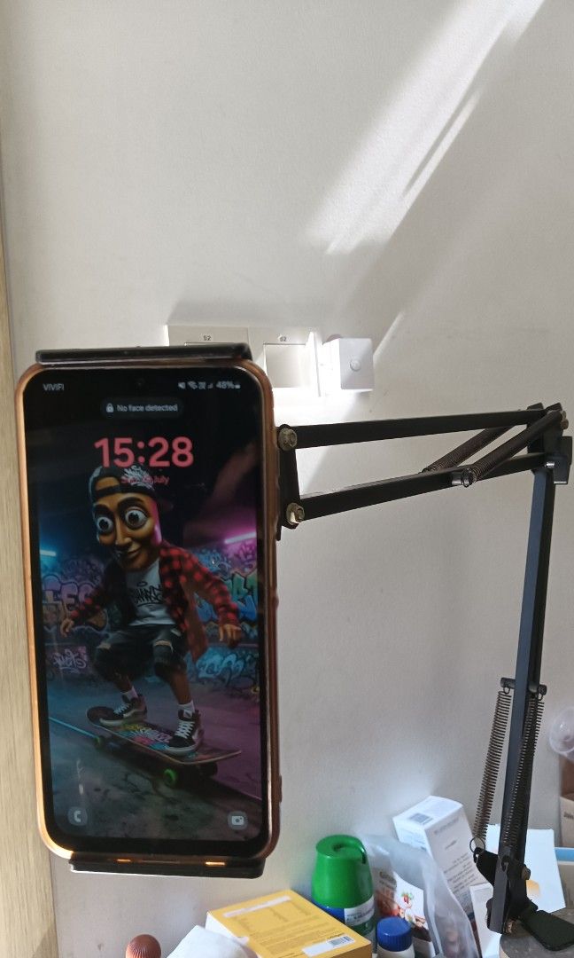 Handphone holder extendable arm (Category: Other Mobile & Gadget Accessories) located in Singapore. Submitted by swordtail (Listing ID 1450600708, Image 1). Description: Handphone holder extendable arm. well used not for fussy. Pick up from Upper Serangoon View 534042.