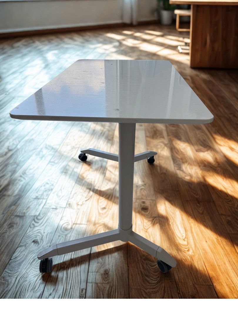 Height Adjustable Table (Category: Tables & Sets) located in Singapore. Submitted by wondersbywonders (Listing ID 1450545310, Image 3). Description: Office/Study table that can adjust height White and with wheels that can easily move around Table size: 100cm (L) x 60cm (D) x 175cm (H) / 80cm (H).